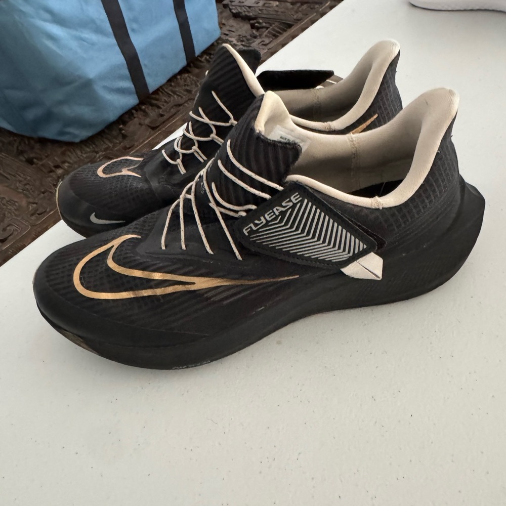 Nike Black and Gold FlyEase Running Sneakers